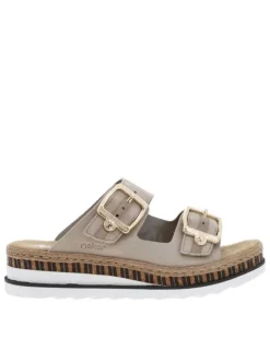 Mules en cuir beiges à talon compensé bas et à sangles à grandes boucles