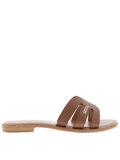 Mules en cuir café à semelle plate avec des surpiqûres ton sur ton