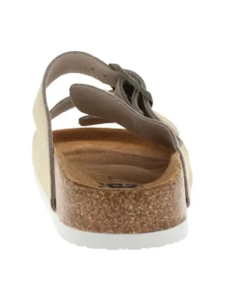 Mules en cuir ivoire à talons plats avec deux boucles à ardillon