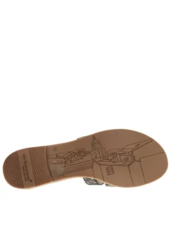 Mules en cuir noires à semelle plate avec un effet zébré doré à l'avant