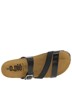 Mules en cuir noires à talon compensé avec une boucle à ardillon