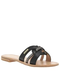 Mules en cuir noires à talon plat avec un aspect tacheté sur les brides avants