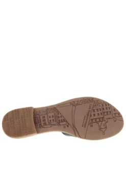 Mules en cuir noires à talon plat avec un aspect tacheté sur les brides avants