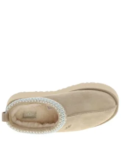 Mules en cuir sable à talon compensé avec logo embossé sur l’avant