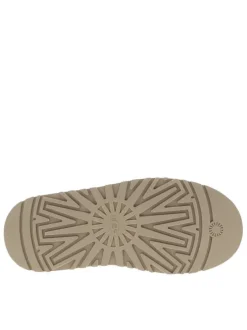 Mules en cuir sable à talon compensé avec logo embossé sur l’avant