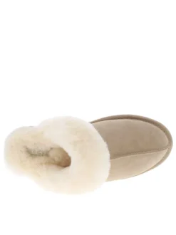 Mules en cuir taupe à talon plat pourvues de fausse fourrure