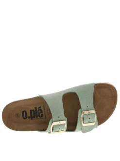 Mules en cuir vertes à talon plat avec deux boucles à ardillon