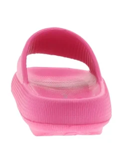 Mules fuchsia à semelle plate avec un logo à l'intérieur et une matière texturée