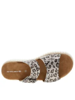 Mules léopard à semelle plate avec une fermeture à boucle à ardillon