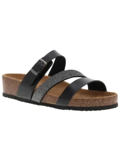 Mules noires avec un talon compensé bas et une boucle à ardillon