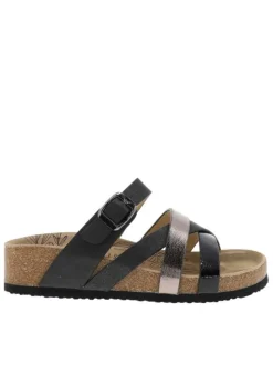 Mules noires avec un talon plat et une fermeture avec boucle à ardillon