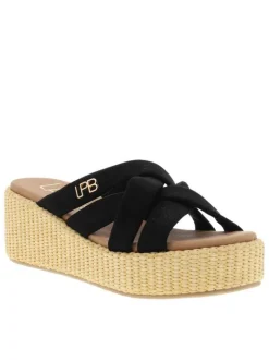 Mules noires avec un talon semi-compensée et des sangles croisées
