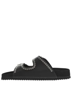 Mules noires à œillets métalliques et à boucles à ardillon sur le côté