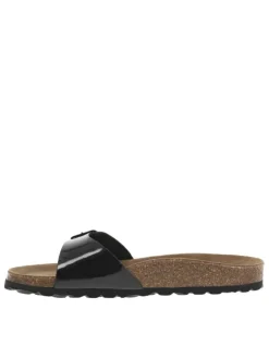 Mules noires vernies avec un aspect liège et une boucle à ardillon sur la bride