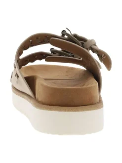 Mules taupe en suède à semelle plate et à sangles à boucle à ardillon
