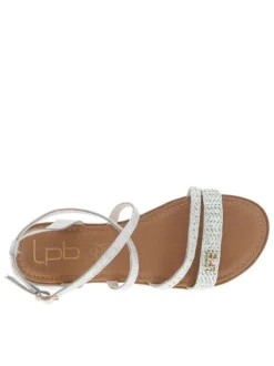 Nu-pieds argentés avec le logo métallique et une boucle à ardillon