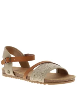 Nu-pieds beiges à semelle plate et une fermeture à boucle à ardillon