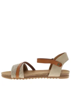Nu-pieds beiges à semelle plate et une fermeture à boucle à ardillon