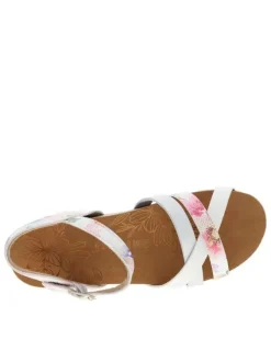 Nu-pieds blancs à semelle compensée bas et à boucle à ardillon
