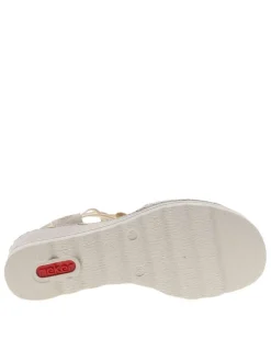 Nu-pieds écrus avec un talon compensé et des lacets élastiqués