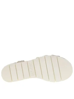 Nu-pieds écrus avec un talon semi-compensée et une bandes élastiquées
