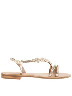 Nu-pieds dorés à talon décroché bas avec une boucle à ardillon