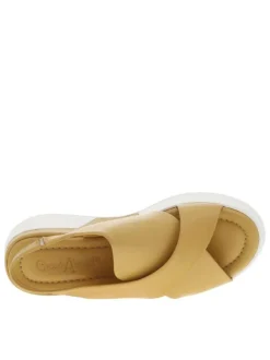 Nu-pieds en cuir jaunes avec chevillière élastiquée et talon semi-compensée
