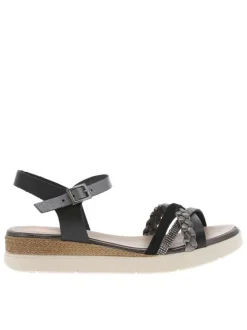 Nu-pieds en cuir noirs à boucle à ardillon avec un talon compensé bas
