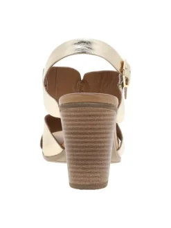 Nu-pieds en cuir or à semelle décrochée haute et à boucle à ardillon