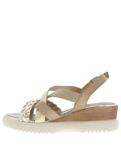 Nu-pieds en cuir taupe à talon compensé avec semelle crantée et lanières dorées
