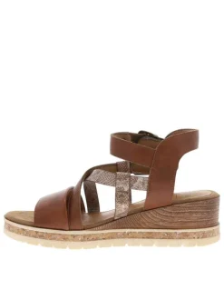 Nu-pieds marron avec une semelle compensée et des boucles à ardillon