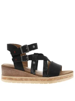 Nu-pieds noirs avec une semelle compensée et des boucles à ardillon