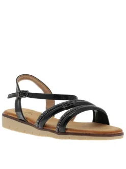 Nu-pieds noirs avec un talon compensé bas et une boucle à ardillon