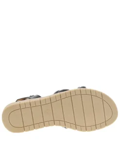 Nu-pieds noirs avec un talon compensé bas et une boucle à ardillon
