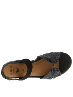 Nu-pieds noirs avec un talon semi-compensée et une bandes élastiquées