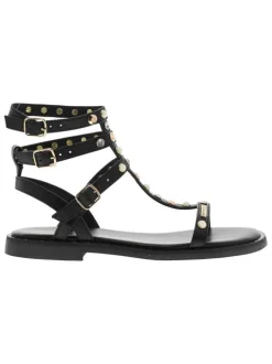 Nu-pieds noirs hauts en cuir avec un talon plat et une boucle à ardillon