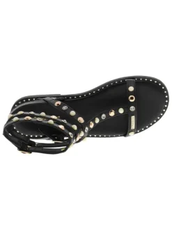 Nu-pieds noirs hauts en cuir avec un talon plat et une boucle à ardillon