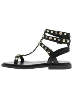 Nu-pieds noirs hauts en cuir avec un talon plat et une boucle à ardillon
