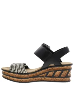 Nu-pieds noirs à semelle compensée haute et à boucle à ardillon