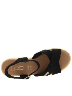Nu-pieds noirs à talon semi-compensée avec une boucle à ardillon
