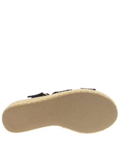 Nu-pieds noirs à talon semi-compensée avec une boucle à ardillon