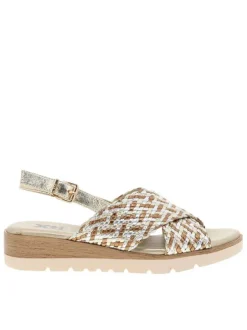 Nu-pieds or avec un talon compensé bas et une boucle à ardillon