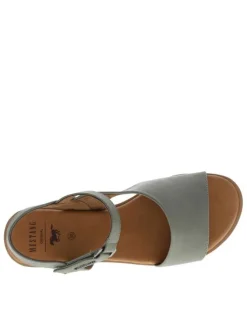 Nu-pieds verts avec un talon plat et une bande auto-agrippante