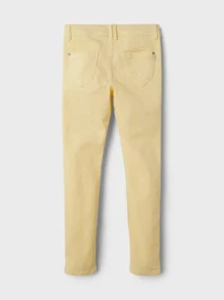 Pantalon beige uni avec une coupe skinny et une taille ajustable