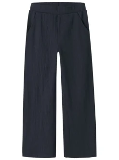 Pantalon chino marine uni pourvu d'une taille élastiquée et d'une coupe fluide