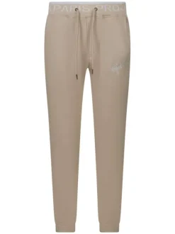 Pantalon de jogging beige uni avec une coupe slim et une taille haute