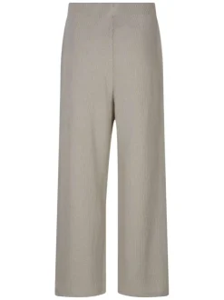 Pantalon beige uni pourvu d'une coupe large et d'une taille haute