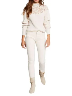 Pantalon blanc uni avec une coupe slim et une taille intermédiaire