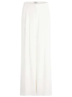 Pantalon blanc uni pourvu d'une coupe large et de détails plissés