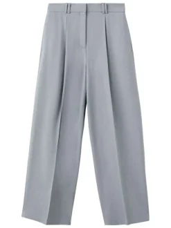 Pantalon bleu gris uni avec une coupe bootcut et une braguette zippée